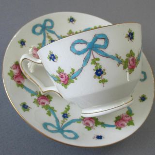 Vintage Crown Staffordshire Bone China Cup,  Saucer Pink Roses Blue Bows Swags