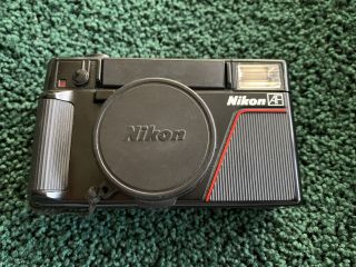 Vintage Nikon L35af 35mm F/2.  8 Lens Point & Shoot.  Asa 25 - 400.  With Case