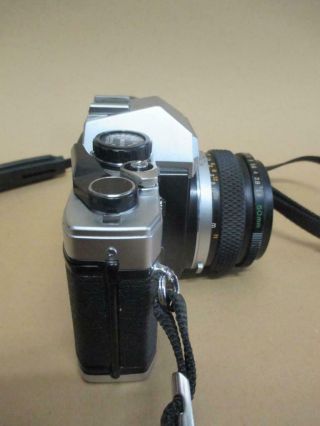 Olympus OM - 10,  35mm SLR camera,  50mm Zuiko lens,  vintage 3
