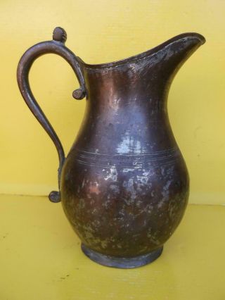 302 / Antique Middle Eastern Copper Jug With Hand Wrought Handle