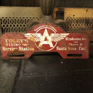 Vintage Foley’s Flying A Metal License Plate Topper Sign
