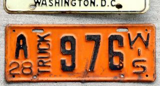 1928 Black On Orange Wisconsin Truck License Plate