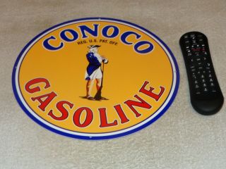 Vintage Conoco Gasoline Minuteman W/ Gun 11 3/4 " Metal Motor Oil Sign Pump Plate