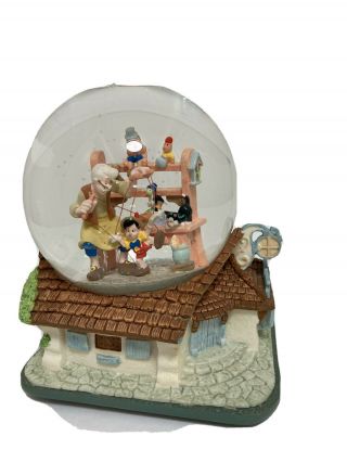 Retired Disney Pinocchio Snow Globe And Music Box " When You Wish Upon A Star "