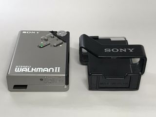 Vintage Sony Walkman WM - 2 Cassette Player for repairs,  w/ Belt clip & MDR - W11 2