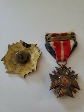 Antique Veterans of Foreign Wars VFW Medal and Hat Badge 2