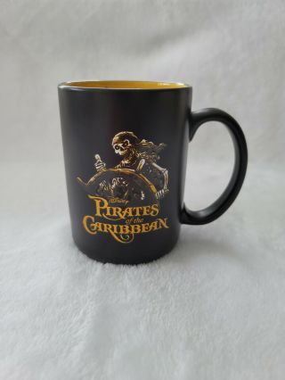 Disney Parks Pirates Of The Caribbean Coffee Mug - Black Gold Skeleton Ships Wheel