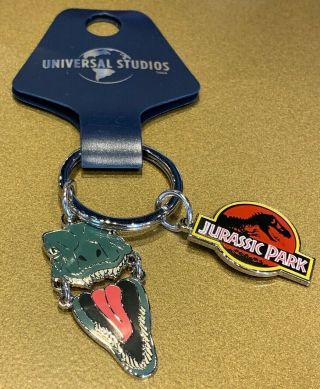 Universal Studios Exclusive Jurassic Park T - Rex And Logo Enamel Keychain