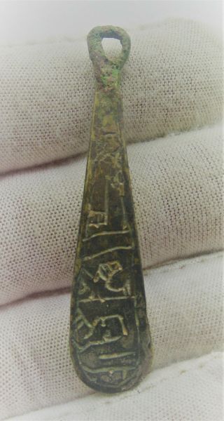 Detector Finds Ancient Viking Bronze Amulet With Runic Symbols