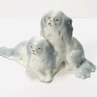 Two Havanese Dogs One Sitting One Laying Down Ceramic Figurine