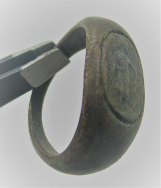 An Ancient Bronze Ring With A Depiction Of A Ruler Or God On The Bezel