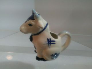 Vintage White & Blue Porcelain/pottery Sitting Cow Creamer