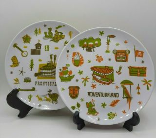Disney Parks Set Of 2 Plastic Plates Frontierland And Adventureland 8 "