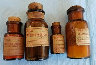 4 Antique Merck Poison Bottles