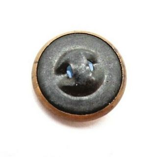 Small antique metal button,  ornate brass border with blue faceted glass jewel 3