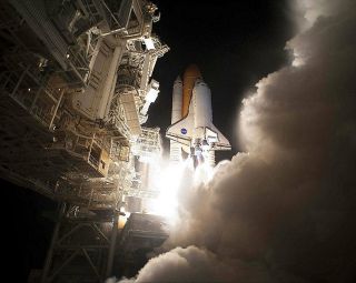 Sts - 131 Discovery Lifts Off 8x10 Silver Halide Photo Print