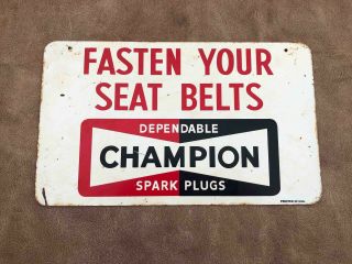 Champion Spark Plugs Fasten Your Seat Belts Painted Metal Advertising Sign