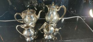An Antique 4 Piece Silver Plated Tea Set.  John Turton Sheffield.  Engraved Patterns
