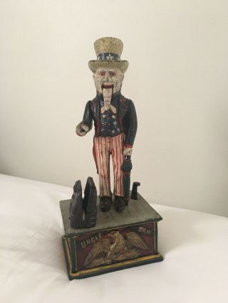 Vintage Heavy Cast Iron Uncle Sam Mechanical Coin Bank