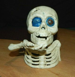 Skeleton Skull Cast Iron Mechanical Bank Hand Feeds $$ Into Eye