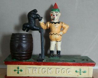 CAST IRON TRICK DOG MONEY BOX 2