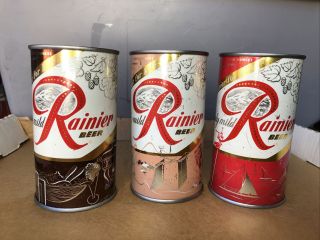 (3) 12oz Sicks Spokane,  Wa Rainier Jubilee Flat Top Beer Cans Brown,  Red,  Flesh