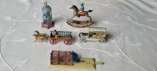 5 Antique German Tin Penny Toys By Meier