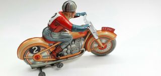 Tin Toy Technofix Wind Up Tricky Motorcycle Ge255 (fall And Raises)