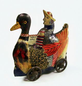 Pre War Dutch Missionary Riding Mandarin Duck Japanese Tin Penny Toy Nr