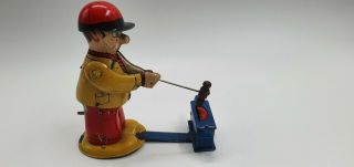 Tin Toy Nomura Man With Swinging Hammer - -