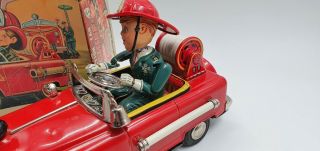 Tin Toy Nomura Battery operated Mystery Action Fire Chie car,  box 4