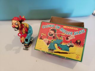 Vintage Mechanical Toy Clown On Roller Skate Japan Tin Clockwork