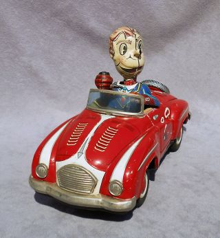 Smoky Joe Tin Bump & Go Toy Car Marusan Battery Operated Tobacco Pipe Lights - Up