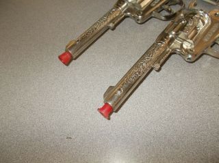 Cap gun toy pistol pair vintage antique diecast Hubley Marshal USA made 3