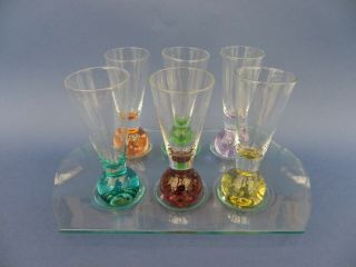 Harlequin Shot Glasses With Coloured Base Set Of 6 On Glass Tray.