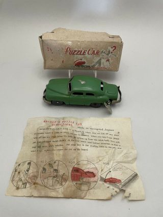 Vintage Occupied Japan Kosuge Tin Wind - Up " Puzzle Car " W/ Box & Instructions