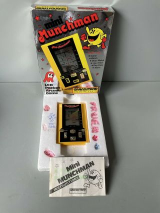 Vintage Grandstand Mini Munchman Pacman Lcd Electronic Handheld Game Clock Watch
