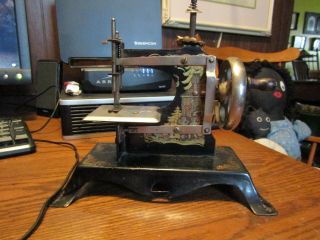 71/2 " T X 8 W German Early Childs Sewing Machine Stenciled W/ Children And Witch