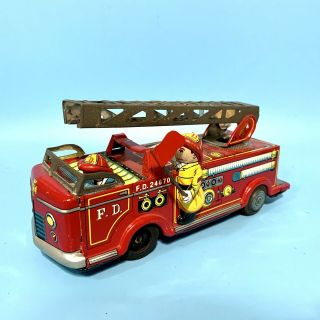 Vintage Tin Fire Engine Ladder Truck Friction Litho Toy Japan Tn Nomura 24670