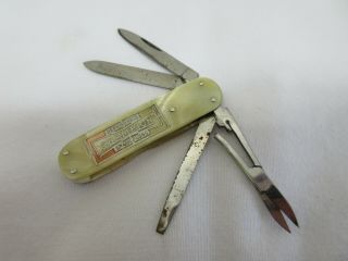 Vintage Champion Dependable Spark Plugs Pocket Knife 4 Blade Celluloid Handle