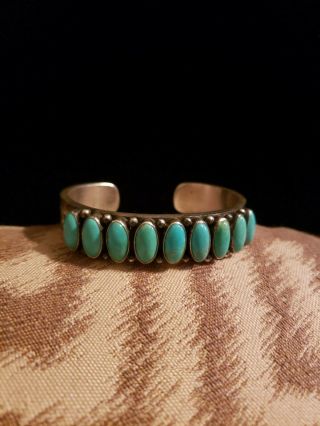 Highly Collectible Kirk Smith Navajo Turquoise Row Sterling Silver Cuff Bracelet