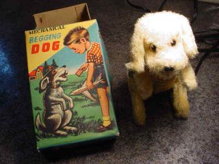 Vintage T.  N.  Mechanical Begging Dog Wind - Up Toy