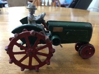 Vintage Cast Iron Tractor With Driver Green Yellow & Red Rolls Good Great Shape