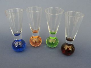 Harlequin Shot Glasses With Coloured Base Set Of 4.