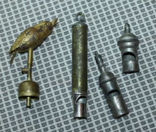 Four Assorted Vintage Whistles