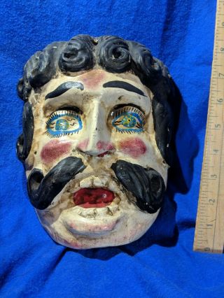 Mask With Curly Hair And Bright Blue Eyes — Authentic Latin American Wood Art