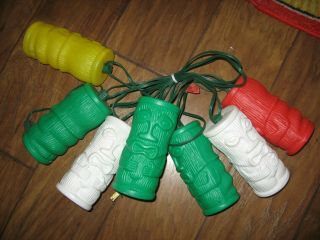 Set Of Seven Vintage Blow Mold Type Plastic Tiki Gods Patio Lights String