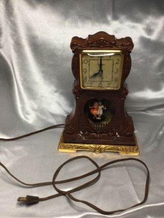 Vintage United Swinging Sweethearts Motion Electric Clock All
