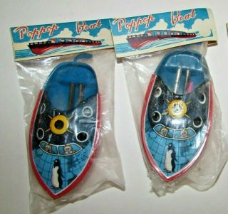 2 Vtg Pop Pop Boats Candle Tin Toy Japan Space Rockets Penguin In Pkg
