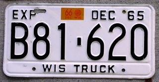 1965 Black On White Wisconsin Truck License Plate With A 1966 Sticker